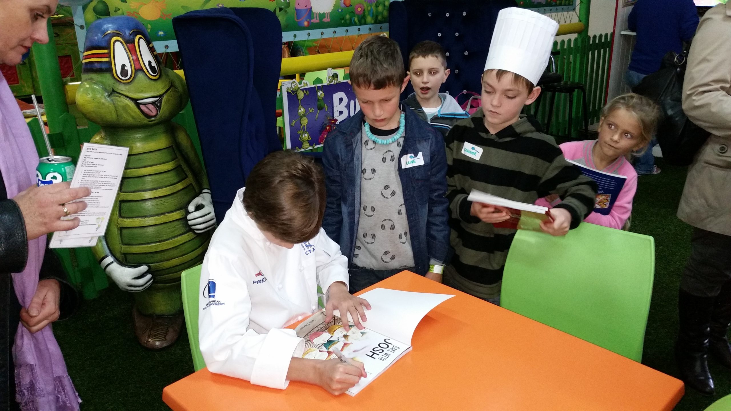 Josh signing books at Lansersking Bugz Park